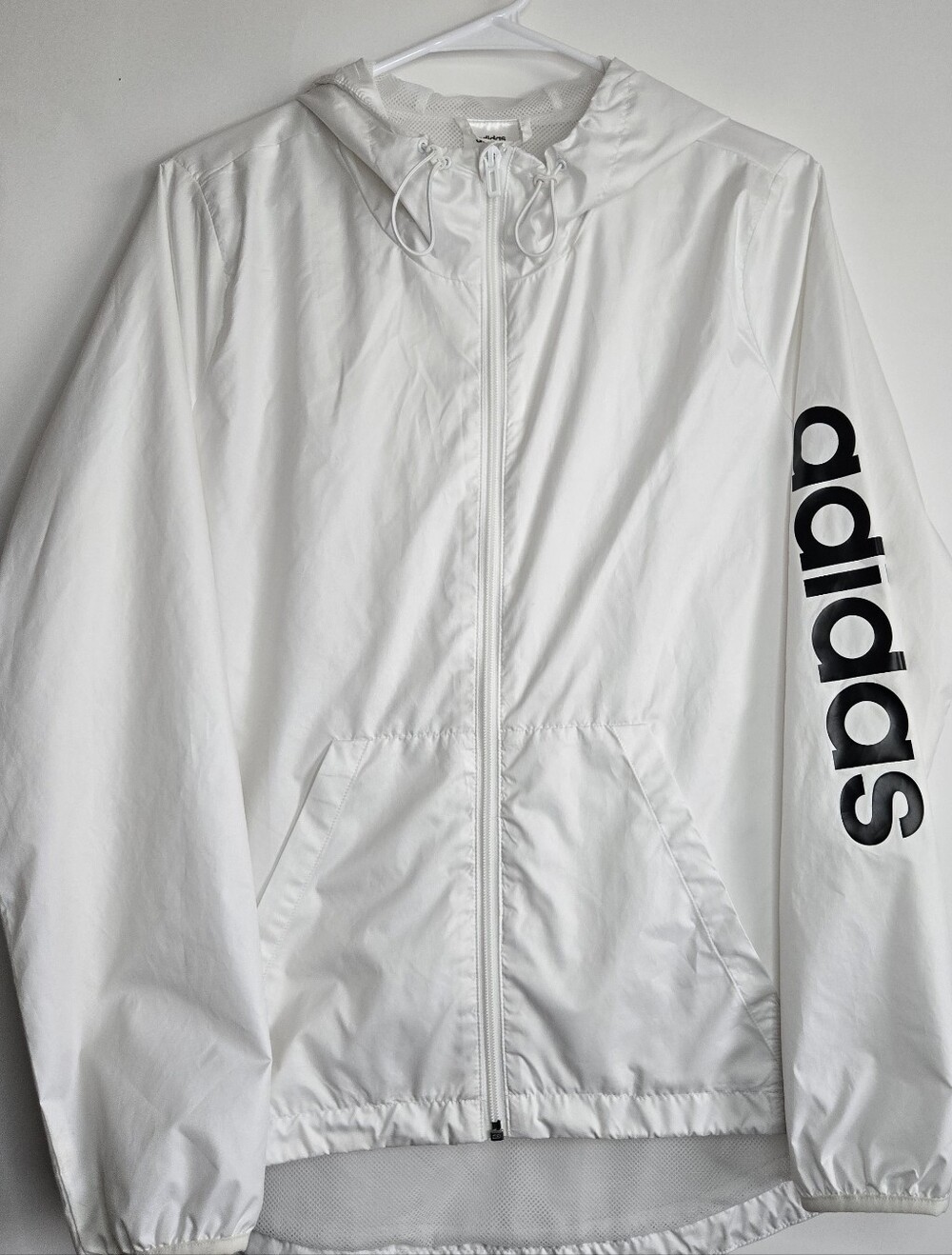 Women's adidas White Hooded Windbreaker with Black Sleeve Logo Text